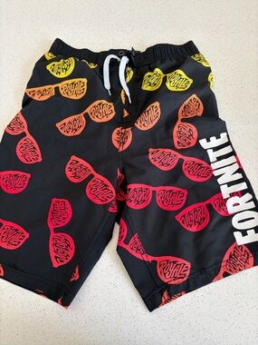 Kids Fortnite Black Swim Shorts with Red & Yellow Print
